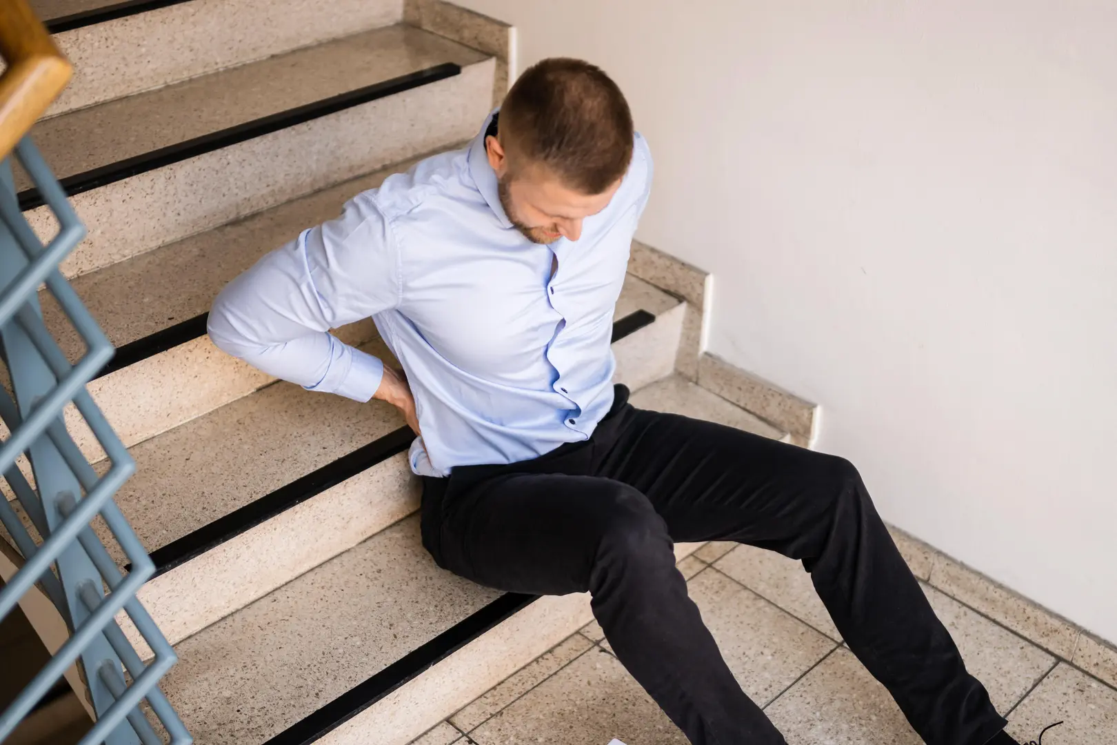A man who slipped and fell down wet stairs and needs to hire an Austin personal injury attorney to pursue compensation.